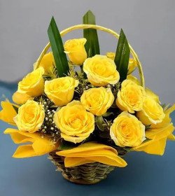 Cheerful Basket of Sun kissed Yellow Roses with Greens