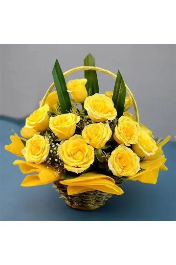 Cheerful Basket of Sun kissed Yellow Roses with Greens
