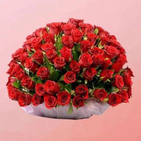 Mesmerizing Display of Red Roses with Greens in Basket Mesmerizing Display of Red Roses with Greens in Basket