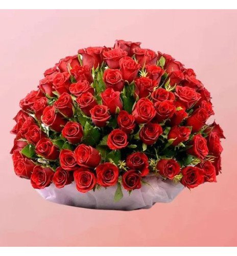 Mesmerizing Display of Red Roses with Greens in Basket